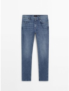 Зауженные джинсы с эффектом потертости цвет: Индиго