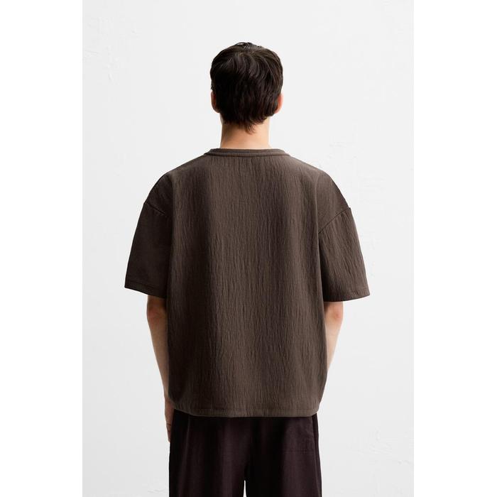 EX</span>ФУТБОЛКА ПРИТАЛЕННОГО <span translate="no">RELAXED КРОЯ