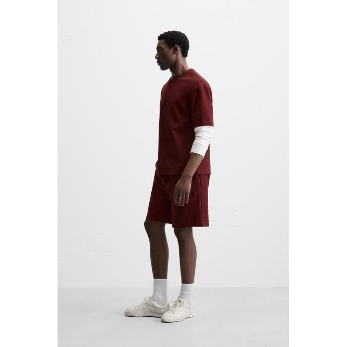 EX</span>ФУТБОЛКА ПРИТАЛЕННОГО <span translate="no">RELAXED КРОЯ