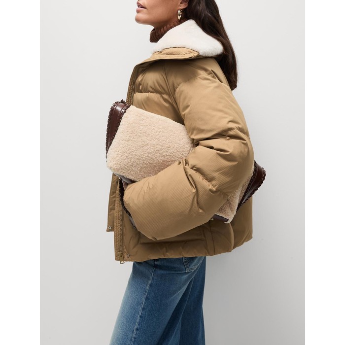 пуховики Stormwear™ из перьев и пуха