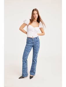 Эластичные джинсы-клеш с низкой посадкой
